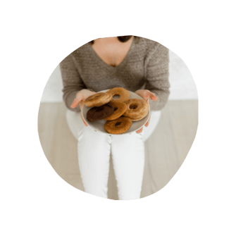jen holding homemade donuts